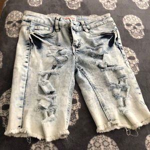 Long ripped shorts